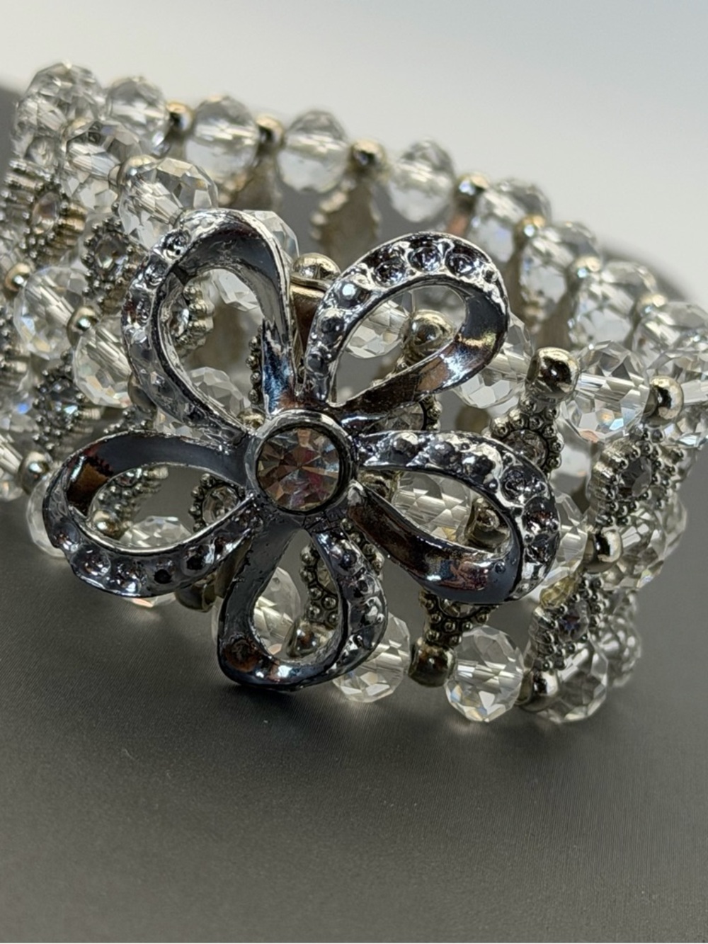Silver Crystal Stretch Bracelet with Silver Tone Rhinestone Flower Brooch